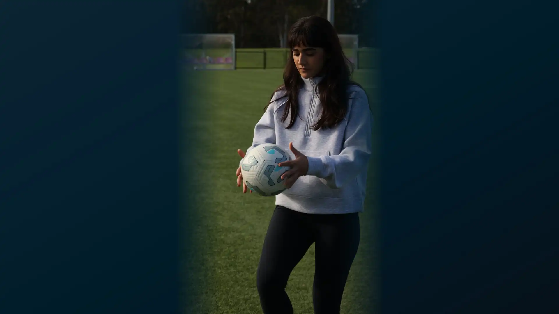 Astra United women's player juggling the ball in the late-afternoon sun at DISC Darebin